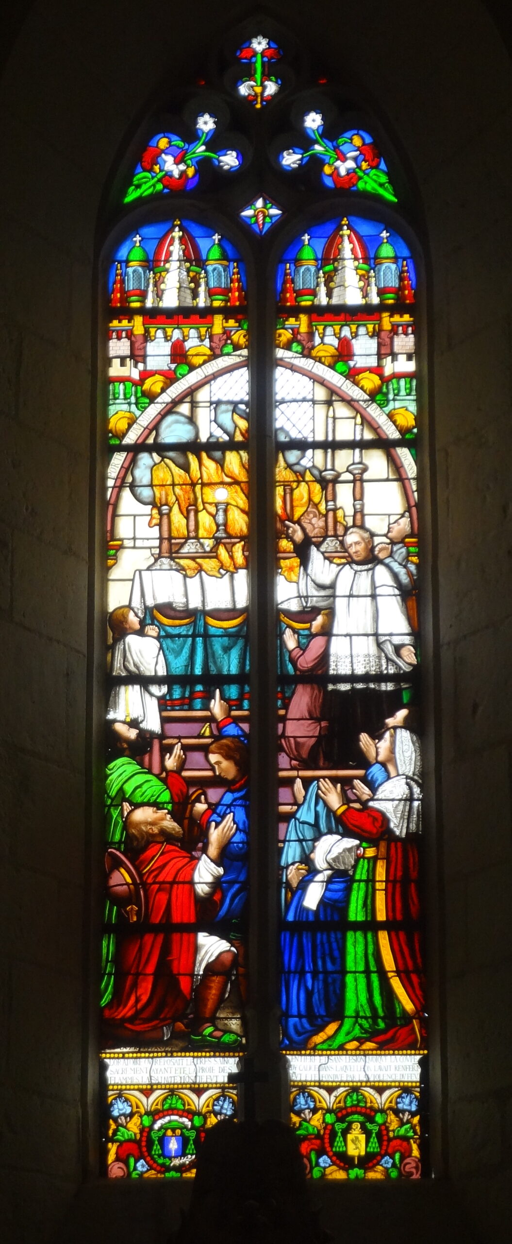Vitral de la iglesia de San Justo que representa el incendio eucarístico de Pressac de 1643
